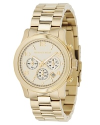 MICHAEL Michael Kors classic chronograph three-link bracelet watch in stainless steel. Round yellow goldtone dial with Arabic numbers. Three subdials and date display.