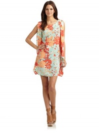 THE LOOKAllover floral printEpaulettes at shouldersPleated dolman sleevesPullover styleTHE FITAbout 34 from shoulder to hemTHE MATERIALSilkCARE & ORIGINDry cleanMade in USAModel shown is 5'10 (177cm) wearing US size Small. THE LOOKAllover floral printEpaulettes at shouldersPleated dolman sleevesPullover styleTHE FITAbout 34 from shoulder to hemTHE MATERIALSilkCARE & ORIGINDry cleanMade in USAModel shown is 5'10 (177cm) wearing US size Small.