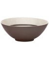 A universal favorite, the Lucia serving bowl combines a modern shape and classic style. Earthy stoneware with a crackle effect and lustrous metallic glaze brings easy sophistication to casual settings. By Niels Refsgaad for Dansk.