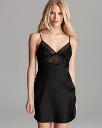 Bedtime becomes an occasion in and of itself with this elegant, lace-accented chemise from Calvin Klein Underwear. Bedtime becomes an occasion in and of itself with this elegant, lace-accented chemise from Calvin Klein Underwear.