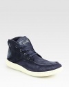 A remarkably cool lace-up with urban appeal designed in slightly-distressed canvas and suede.Canvas/suede upperPadded insoleRubber soleImported