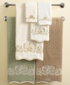 Soft and feminine, the Venetian Scroll bath towel marries a delicate look with durable Egyptian cotton. Swirling blooms embroidered in creamy shades echo a bound, scalloped edge. In muted sage, ivory and linen for serene elegance.