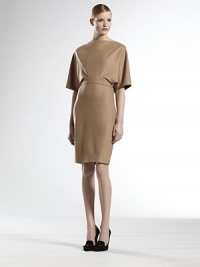 This modern pencil-skirted silhouette features a detachable tie-back cape.BoatneckSleevelessDetachable cape with short sleeves, button closure and tie back95% lamb wool/4% cashmere/1% elastaneDry cleanMade in ItalyModel shown is 5'11 (180cm) wearing US size 4. This modern pencil-skirted silhouette features a detachable tie-back cape.BoatneckSleevelessDetachable cape with short sleeves, button closure and tie back95% lamb wool/4% cashmere/1% elastaneDry cleanMade in ItalyModel shown is 5'11 (180cm) wearing US size 4.