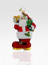 Hand-painted and glitter-dusted, an artfully crafted Santa of European glass rests inside an oversized boot. Hand-blownHand-painted5½ tallMade in Poland Hand-painted and glitter-dusted, an artfully crafted Santa of European glass rests inside an oversized boot. Hand-blownHand-painted5½ tallMade in Poland