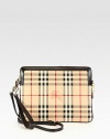 An ultra-protective iPad® case featuring the iconic Burberry check with rich leather trim. Adjustable detachable leather shoulder strap, 20-23 dropDetachable leather wristlet strap, 9 dropTop zip closureOne inside open pocketCotton lining10½W X 8H X 1½DImportedPlease note: iPad® not included.