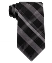 Add punch to any outfit with this plaid silk tie from DKNY. Add punch to any outfit with this plaid silk tie from DKNY.