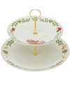 A holly motif drawn from the classic Holiday dinnerware pattern combined with colorful new depictions of the Christmas season makes this tiered server by Lenox a festive addition to any table, as well as a beautiful gift. Bottom plate adorned with Home for the Holidays.