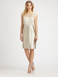 Beautiful beading adorns this sweetheart dress with classic shaping darts on its sleek skirt.Sheer overlay at sweetheart necklineCap sleevesConcealed front closureShaping dartsConcealed back zipperFully linedAbout 27 from natural waistBodice: silkSkirt: silk/cotton/rayonDry cleanImportedSIZE & FIT Model shown is 5'10½ (179cm) wearing a US size 4. Beautiful beading adorns this sweetheart dress with classic shaping darts on its sleek skirt.Sheer overlay at sweetheart necklineCap sleevesConcealed front closureShaping dartsConcealed back zipperFully linedAbout 27 from natural waistBodice: silkSkirt: silk/cotton/rayonDry cleanImportedSIZE & FIT Model shown is 5'10½ (179cm) wearing a US size 4.