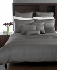 Sleek and sophisticated, this Hotel Collection Frame queen quilt adds modern flair to your bedroom. With a rectangular quilted pattern on the surface and taped edges, this sleek quilt will woo you with its deep nickel tones. Sleek and sophisticated, this Hotel Collection Frame queen quilt adds modern flair to your bedroom. With a rectangular quilted pattern on the surface and taped edges, this sleek quilt will woo you with its deep nickel tones.