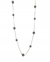 Alfani's long station necklace is sure to be a diverse, dramatic look within your jewelry collection. Crafted in hematite tone mixed metal. Approximate length: 42 inches.