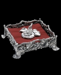 Grapes clustered and draped around this polished aluminum napkin holder embody the all-natural artistry of Arthur Court. A charming complement to wine and cheese parties! Grapes clustered and draped around this polished aluminum napkin holder embody the all-natural artistry of Arthur Court. A charming complement to wine and cheese parties!