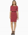 Tailor stripes and anchor-embossed buttons give a seafaring spirit to Lauren by Ralph Lauren's fine-ribbed cotton dress, accented with rope belt at the waist for a chic finishing touch.