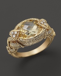 Oval canary crystal stone accented with heart-shaped diamond prongs and textured band in 18K gold. By Judith Ripka. Oval canary crystal stone accented with heart-shaped diamond prongs and textured band in 18K gold. By Judith Ripka.