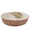 Serve up the flavor of the Caribbean with this versatile serving bowl from this collection of Gibson dinnerware and dishes. A large, hand-painted palm tree, and stripes of green and yellow accents make a fun, versatile addition to any summer soireé.