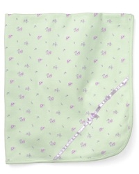 A cozy blanket for after bathtime or bedtime, this cute lilac print piece will be a favorite for years to come. A cozy blanket for after bathtime or bedtime, this cute lilac print piece will be a favorite for years to come.