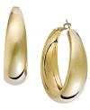 Ladies, let's talk hoops! Big or small, silver or gold, every girl needs 'em in her collection! INC International Concepts' statement-making style features a wide hoop design set in gold tone mixed metal. Approximate diameter: 2 inches.