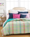 Perfectly preppy in plaid, this Shirting Madras comforter from Lauren Ralph Lauren evokes a true sense of style. Features an array of pastel hues and reverses to solid. Complement the look with other Ralph Lauren components.