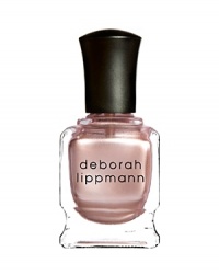Deborah Lippmann has been obsessed with a rose gold watch and since she hasn't received one in her Xmas stocking she decided the next best thing would be to wear the color on her nails. It has taken her 3 years to get the luxurious finish in this shade. Deborah Lippmann has been obsessed with a rose gold watch and since she hasn't received one in her Xmas stocking she decided the next best thing would be to wear the color on her nails. It has taken her 3 years to get the luxurious finish in this shade.