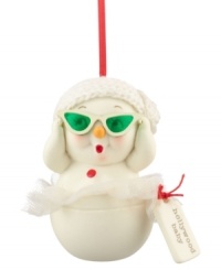 Ready for her closeup, the Hollywood baby snowman slips on evergreen-tinted shades for a bit of holiday drama. A knitted cap completes her chic look from Department 56. Ready for her closeup, the Hollywood baby snowman slips on evergreen-tinted shades for a bit of holiday drama. A knitted cap completes her chic look from Department 56.