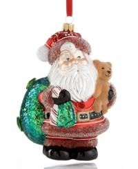 A jolly, happy soul! This mouth-blown glass Santa ornament from Vaillancourt is delicately crafted with gem, beaded and sparkling details for a brilliant addition to any Christmas tree. A jolly, happy soul! This mouth-blown glass Santa ornament from Vaillancourt is delicately crafted with gem, beaded and sparkling details for a brilliant addition to any Christmas tree.