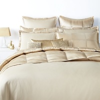 A touch of silk brings sophisticated style to any bed with this luminous Donna Karan king bedskirt in a dreamy gold leaf hue. A touch of silk brings sophisticated style to any bed with this luminous Donna Karan king bedskirt in a dreamy gold leaf hue.
