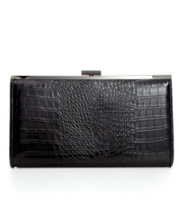 Explore the exotic in evening accessorizing with this posh, croc-embossed bag from BCBGMAXAZRIA. Signature hardware and slim shoulder strap add instant elegance, while the interior discretely stows phone, cash, cards and lipstick. Explore the exotic in evening accessorizing with this posh, croc-embossed bag from BCBGMAXAZRIA. Signature hardware and slim shoulder strap add instant elegance, while the interior discretely stows phone, cash, cards and lipstick.