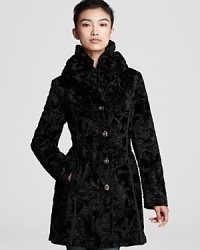 Laundry by Shelli Segal's reversible coat makes for plush pickings. Select faux fur for a luxe winter look, and reverse to the quilted, water-resistant side when the rain starts. Laundry by Shelli Segal's reversible coat makes for plush pickings. Select faux fur for a luxe winter look, and reverse to the quilted, water-resistant side when the rain starts.