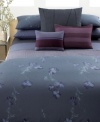 In late-evening hues and a rice-paper print of iris blossoms, Calvin Klein's Smoke Flower comforter brings to mind the elegance of night. Reverses to self.