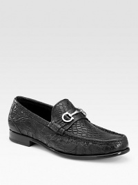 Elegant crocodile with striking gancini ornament for that signature touch.Silvertone bit detail Leather lining Padded insole Leather sole Made in Italy Elegant crocodile with striking gancini ornament for that signature touch.Silvertone bit detail Leather lining Padded insole Leather sole Made in Italy
