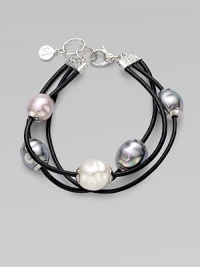 This three-row piece is a beautiful mix of lustrous pearls on sturdy black leather cord. 12mm Baroque white, grey and nuage organic man-made pearls with sterling silver capsLeather cord Lobster clasp closureLength, about 7½Imported This three-row piece is a beautiful mix of lustrous pearls on sturdy black leather cord. 12mm Baroque white, grey and nuage organic man-made pearls with sterling silver capsLeather cord Lobster clasp closureLength, about 7½Imported