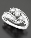 Stunning prong-set diamonds in a ribbon of sparkle. Diamond ring (1-1/2 ct. t.w.) set in 14k white gold.