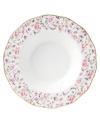 Scattered with dainty blooms, the Rose Confetti rim soup bowl restores the grace and charm of another era in fine bone china from Royal Albert. A scalloped edge with gold banding and a traditionally feminine palette add to its romantic sensibility.