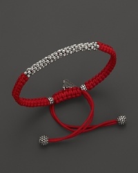 A hand braided cord bracelet in a saturated hue is adorned with Lagos' signature Caviar™ beads and finished with an adjustable closure. A hand braided cord bracelet in a saturated hue is adorned with Lagos' signature Caviar™ beads and finished with an adjustable closure.