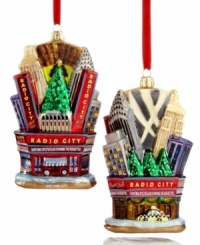 Make it a Christmas spectacular with the show-stopping Rockettes and so much more in this Radio City Christmas Hall ornament from Kurt Adler. Shown front and back. Make it a Christmas spectacular with the show-stopping Rockettes and so much more in this Radio City Christmas Hall ornament from Kurt Adler. Shown front and back.