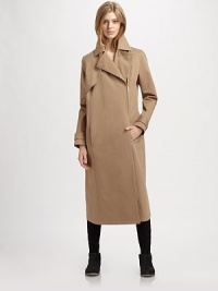 Modernized by an asymmetrical zipper, this military-inspired trenchcoat has notched lapels, slash pockets and a back vent for mobility. Notched lapelsButton frontAsymmetrical zipperLong sleeves with buttoned cuffsSlash pocketsButtoned back belt; back ventAbout 36 from shoulder to hemCottonDry cleanMade in ItalyModel shown is 5'10 (177cm) wearing US size 2. Modernized by an asymmetrical zipper, this military-inspired trenchcoat has notched lapels, slash pockets and a back vent for mobility. Notched lapelsButton frontAsymmetrical zipperLong sleeves with buttoned cuffsSlash pocketsButtoned back belt; back ventAbout 36 from shoulder to hemCottonDry cleanMade in ItalyModel shown is 5'10 (177cm) wearing US size 2.