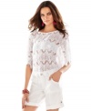 Sexy yet demure, INC's petite eyelash lace top makes the chicest layering piece: try it with a pencil skirt and heels for a dressy look -- or pair it with your brightest, boldest bathing suit for a unique beach coverup!