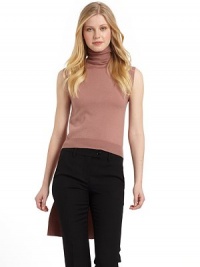 THE LOOKCropped in front with a long, smooth train in backRibbed turtleneckSleevelessRibbed front hemSmooth back panelTHE FITAbout 19 from shoulder to hem in frontAbout 35½ from shoulder to hem in backTHE MATERIALWoolCARE & ORIGINDry cleanMade in ItalyModel shown is 5'9 (175cm) wearing US size 4. THE LOOKCropped in front with a long, smooth train in backRibbed turtleneckSleevelessRibbed front hemSmooth back panelTHE FITAbout 19 from shoulder to hem in frontAbout 35½ from shoulder to hem in backTHE MATERIALWoolCARE & ORIGINDry cleanMade in ItalyModel shown is 5'9 (175cm) wearing US size 4.