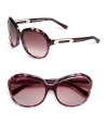 THE LOOKOversized round styleAcetate framesAccented templesUVA and UVB protectionSignature case includedTHE COLORMelange violet with violet gradient lensesORIGINMade in Italy