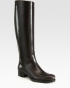 Rich Italian leather forms this timeless equestrian-inspired silhouette. Stacked heel, 1¼ (30mm)Shaft, 16½Leg circumference, 14¾Leather upperExposed side zipperLeather liningRubber trek solePadded insoleMade in Italy