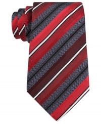 Take a new angle on stripes with this Kenneth Cole Reaction silk tie. Take a new angle on stripes with this Kenneth Cole Reaction silk tie.