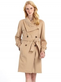 THE LOOKSoft, luxurious fabric with topstitching and trench detailsWide crossover collarDouble-breasted button frontOne button gunflapAngled welt pocketsLong raglan sleeves with buckle tabsGrosgrain lined self tie beltBack rainflapInverted back pleat with two button tabsTHE FITAbout 38 from shoulder to hemTHE MATERIAL75% wool/25% angoraFully linedCARE & ORIGINDry cleanMade in Italy THE LOOKSoft, luxurious fabric with topstitching and trench detailsWide crossover collarDouble-breasted button frontOne button gunflapAngled welt pocketsLong raglan sleeves with buckle tabsGrosgrain lined self tie beltBack rainflapInverted back pleat with two button tabsTHE FITAbout 38 from shoulder to hemTHE MATERIAL75% wool/25% angoraFully linedCARE & ORIGINDry cleanMade in Italy