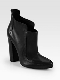 A rounded heel heightens this must-have leather ankle boot with detailed seaming and a classic point toe. Self-covered heel, 5 (125mm)Leather upperPoint toePull-on styleLeather lining and solePadded insoleImported A rounded heel heightens this must-have leather ankle boot with detailed seaming and a classic point toe. Self-covered heel, 5 (125mm)Leather upperPoint toePull-on styleLeather lining and solePadded insoleImported