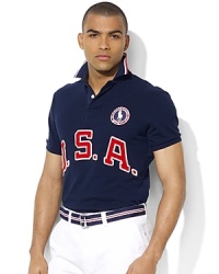Cut for a trim, modern fit from breathable cotton mesh, a short-sleeved polo shirt is accented with bold country embroidery, celebrating Team USA's participation in the 2012 Olympic Games. Cut for a trim, modern fit from breathable cotton mesh, a short-sleeved polo shirt is accented with bold country embroidery, celebrating Team USA's participation in the 2012 Olympic Games.