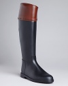 A master of equestrian and rainy day style, Burberry lends these rain boots iconic good looks that will have you reaching for them rain or shine.