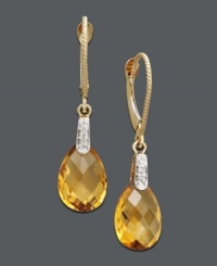 Add warmth to your outfit with chic, citrus colors. Drop earrings feature pear-cut citrine (5-1/3 ct. t.w.) and a dusting of diamond accents. Set in 14k gold. Approximate drop: 1-1/4 inches. Add warmth to your outfit with chic, citrus colors. Drop earrings feature pear-cut citrine (5-1/3 ct. t.w.) and a dusting of diamond accents. Set in 14k gold. Approximate drop: 1-1/4 inches.