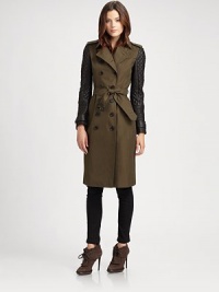 Quilted leather sleeves lend a modern edge to this trench style.EpaulettesDouble-breasted button frontSelf beltButton pocketsQuilted leather sleeves with button tabsButton rainflapBack vent with button-tab closureFully linedAbout 40 from shoulder to hemCottonDry cleanImportedModel shown is 5'10 (177cm) wearing US size 4. Quilted leather sleeves lend a modern edge to this trench style.EpaulettesDouble-breasted button frontSelf beltButton pocketsQuilted leather sleeves with button tabsButton rainflapBack vent with button-tab closureFully linedAbout 40 from shoulder to hemCottonDry cleanImportedModel shown is 5'10 (177cm) wearing US size 4.