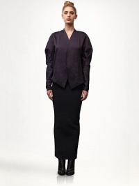 This sculptural silhoeutte is rendered in a luxurious silk/wool blend.Overlap V necklineDolman sleeves68% silk/32% woolDry cleanImportedModel shown is 5'10½ (179cm) wearing US size 4. This sculptural silhoeutte is rendered in a luxurious silk/wool blend.Overlap V necklineDolman sleeves68% silk/32% woolDry cleanImportedModel shown is 5'10½ (179cm) wearing US size 4.