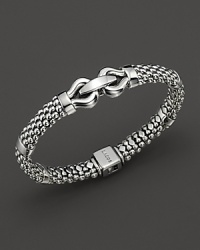 Sterling silver bracelet with intricate details--just right for stacking.