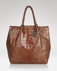 Endlessly versatile on-duty or off, this Elie Tahari tote is a step beyond the tried-and-true, crafted of richly embossed leather. Endlessly versatile on-duty or off, this Elie Tahari tote is a step beyond the tried-and-true, crafted of richly embossed leather.