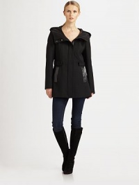 Topped with a roomy hood, this twill-wool coat with leather pockets is destined to stand out from the crowd. Attached hoodConcealed front zipperLeather flap pocketsPrincess seamsFully linedAbout 30 from shoulder to hem51% cotton/32% polyester/17% virgin woolDry clean by leather specialistImported Model shown is 5'11 (180cm) wearing US size Small. Topped with a roomy hood, this twill-wool coat with leather pockets is destined to stand out from the crowd. Attached hoodConcealed front zipperLeather flap pocketsPrincess seamsFully linedAbout 30 from shoulder to hem51% cotton/32% polyester/17% virgin woolDry clean by leather specialistImported Model shown is 5'11 (180cm) wearing US size Small.